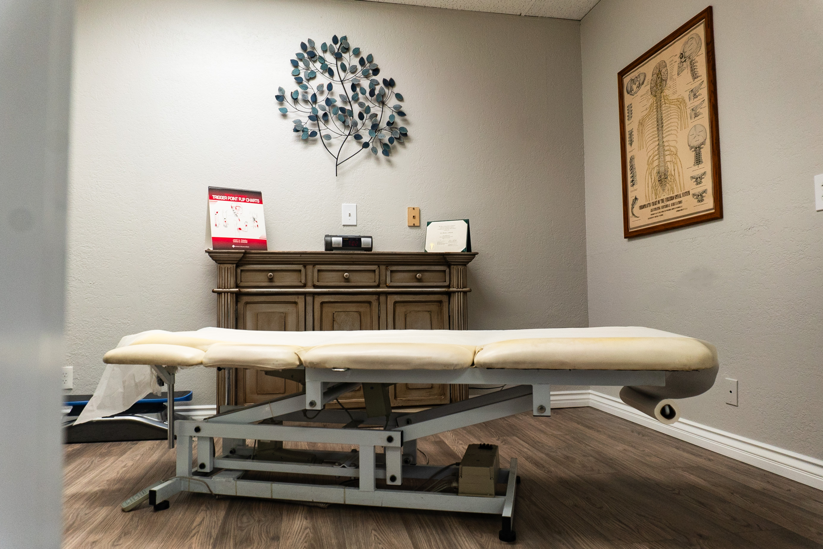 Professional chiropractic treatment room with state-of-the-art equipment